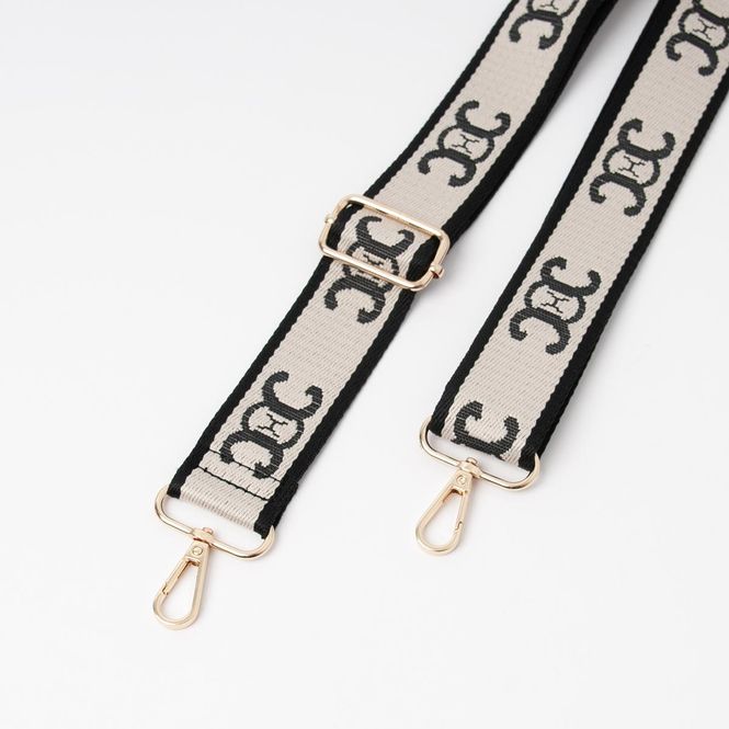 Huvudbild Axelrem beige och svart - väska rem med mönster ...