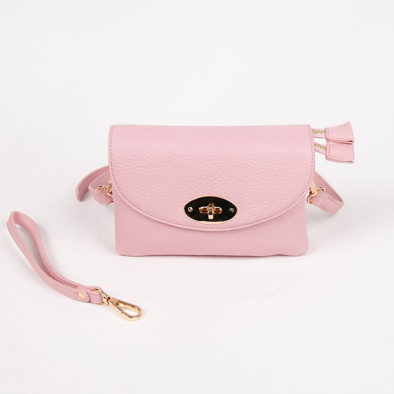 DANIELLE clutch lys rosa i imitert skinn